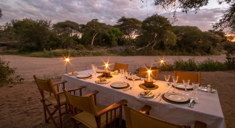 Dinner Set Up By The Riverbed Laba Jongomero Camp